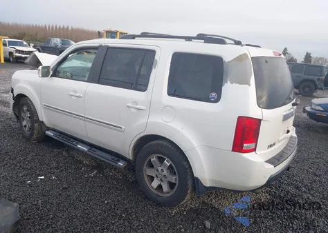 2011 Honda Pilot Touring z USA, uszkodzony, nr VIN 5FNYF4H95BB092349